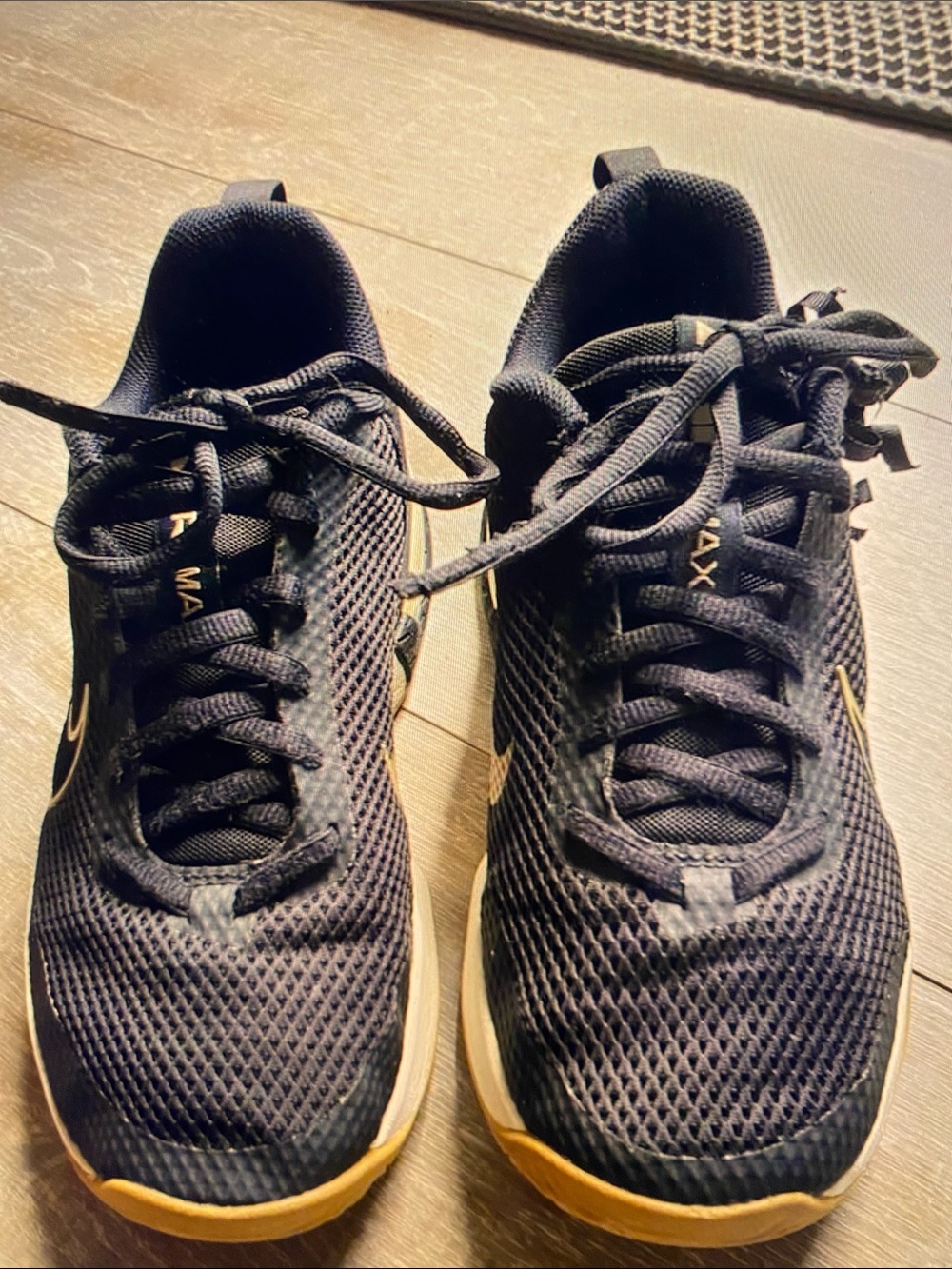 Nike Men’s Black Mesh Sneakers with Gold Accents